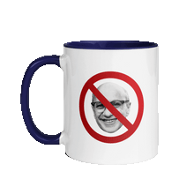 Load image into Gallery viewer, White mug with a dark blue handle and interior. Front of the mug has a photo of Milton Friedman with a red circle strikethrough, and the back of the mug has the Unf*cking The Republic Logo on it.