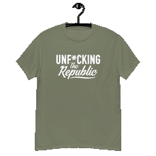 Load image into Gallery viewer, Army green classic tee shirt that says Unf*cking The Republic in white on the front and Meeting People Where They Are in white on the back