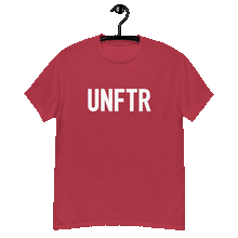 Load image into Gallery viewer, Cardinal colored classic tee shirt that says UNFTR in white on the front and Meeting People Where They Are in white on the back