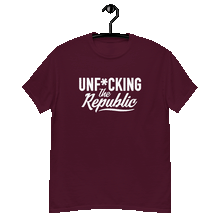 Load image into Gallery viewer, Maroon classic tee shirt that says Unf*cking The Republic in white on the front and F*ck Milton Friedman in white on the back
