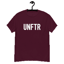 Load image into Gallery viewer, Maroon classic tee shirt that says UNFTR in white on the front and F*ck Milton Friedman in white on the back
