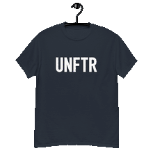 Load image into Gallery viewer, Navy classic tee shirt that says UNFTR in white on the front and Meeting People Where They Are in white on the back