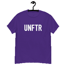 Load image into Gallery viewer, Purple classic tee shirt that says UNFTR in white on the front and Meeting People Where They Are in white on the back