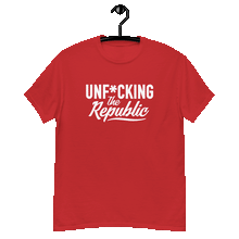 Load image into Gallery viewer, Red classic tee shirt that says Unf*cking The Republic in white on the front and F*ck Milton Friedman in white on the back