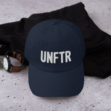 Load image into Gallery viewer, Navy dad hat with white embroidered UNFTR logo