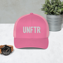 Load image into Gallery viewer, Pink trucker hat with pink side panels with white UNFTR logo embroidered on the front