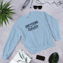 Load image into Gallery viewer, Light blue crew neck with navy logo that say Unf*cking The Republic.