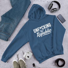 Load image into Gallery viewer, Indigo blue hoodie with white logo that say Unf*cking The Republic.