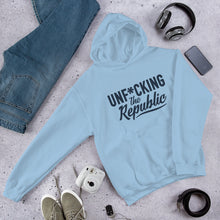 Load image into Gallery viewer, Light blue hoodie with navy logo that say Unf*cking The Republic.