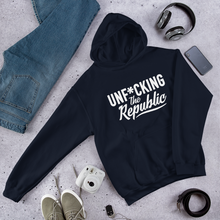 Load image into Gallery viewer, Navy hoodie with white logo that say Unf*cking The Republic.