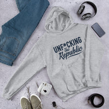 Load image into Gallery viewer, Light heather gray hoodie with navy logo that say Unf*cking The Republic.