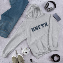 Load image into Gallery viewer, Light heather gray hoodie with navy block letters that say UNFTR.