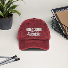 Load image into Gallery viewer, Maroon vintage wash dad cap with white Unf*cking The Republic logo embroidered on the front.
