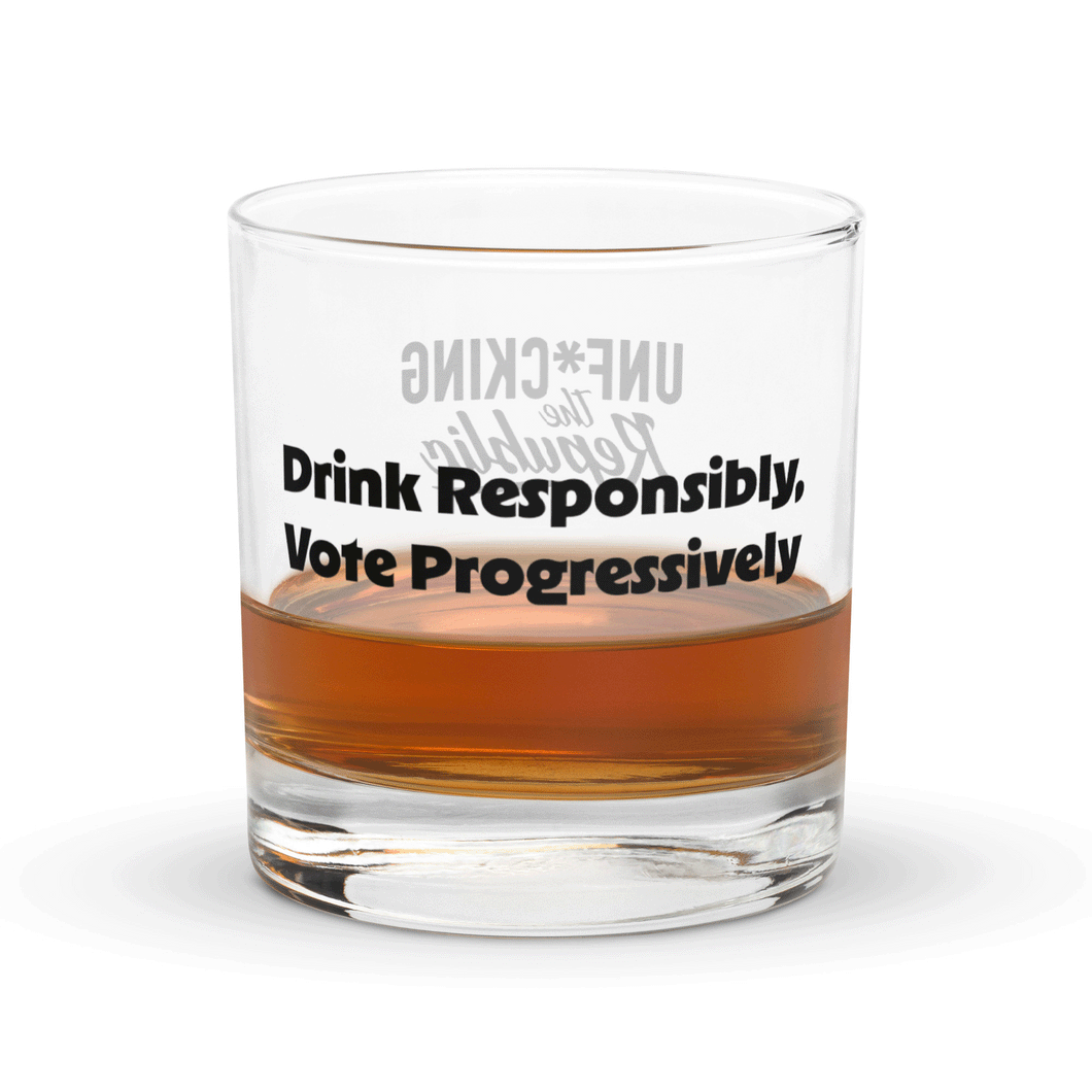 Slightly filled rocks glass with black text that reads Drink responsibly, vote progressively with Unf*cking The Republic logo