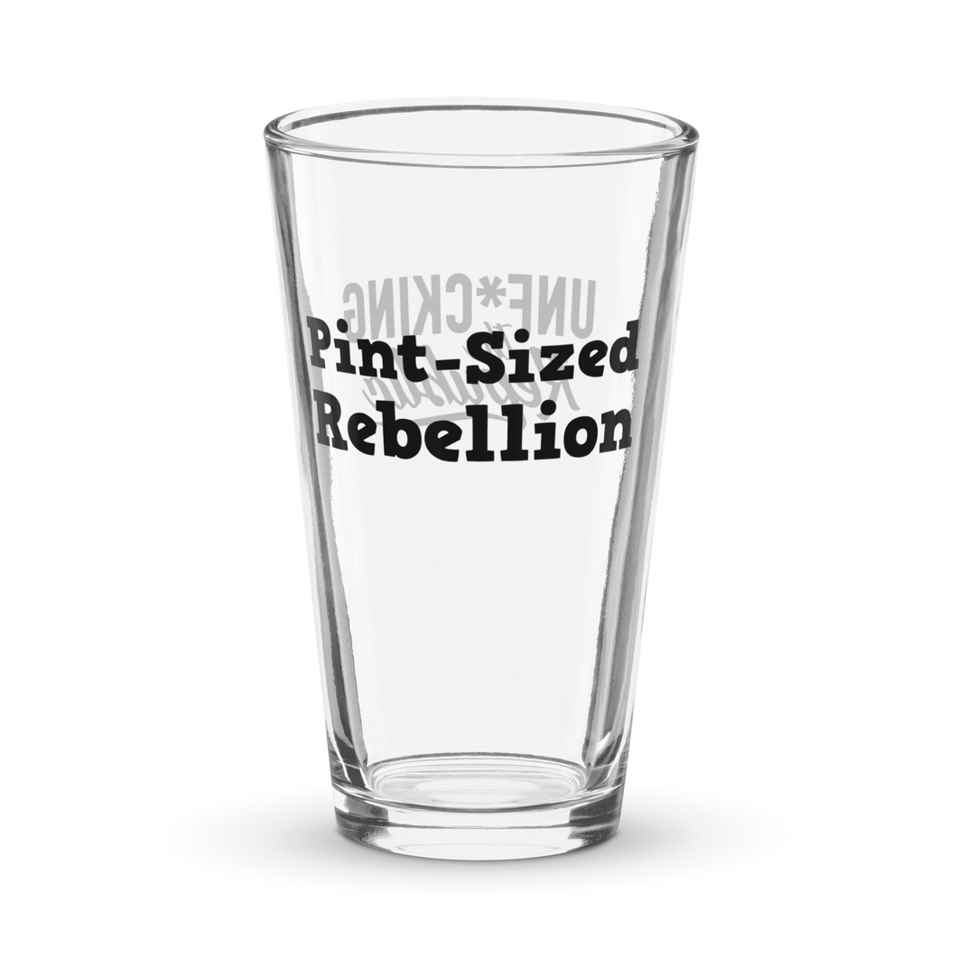 Text that reads 'pint-sized rebellion' and the Unf*cking The Republic logo printed in black on a pint glass.