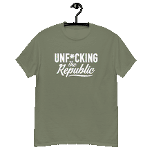 Load image into Gallery viewer, Army green classic tee shirt that says Unf*cking The Republic in white on the front and F*ck Milton Friedman in white on the back
