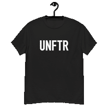 Load image into Gallery viewer, Black classic tee shirt that says UNFTR in white on the front and F*ck Milton Friedman in white on the back
