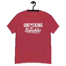 Load image into Gallery viewer, Cardinal colored classic tee shirt that says Unf*cking The Republic in white on the front and Meeting People Where They Are in white on the back
