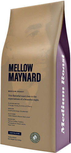 Coffee bag for the Mellow Maynard blend. A ghosted out photo of John Maynard Keynes appears in the background and the side of the bag is light purple with the words Medium Roast