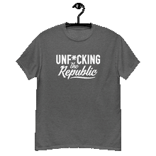 Load image into Gallery viewer, Heather gray colored classic tee shirt that says Unf*cking The Republic in white on the front and F*ck Milton Friedman in white on the back
