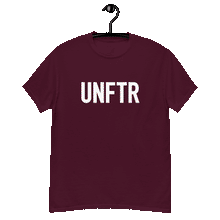 Load image into Gallery viewer, Maroon classic tee shirt that says UNFTR in white on the front and F*ck Milton Friedman in white on the back
