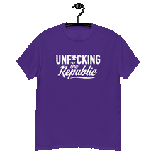 Load image into Gallery viewer, Purple classic tee shirt that says Unf*cking The Republic in white on the front and F*ck Milton Friedman in white on the back
