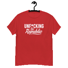Load image into Gallery viewer, Red classic tee shirt that says Unf*cking The Republic in white on the front and Meeting People Where They Are in white on the back

