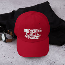 Load image into Gallery viewer, Red dad hat with white embroidered Unf*cking The Republic logo
