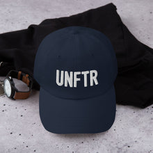 Load image into Gallery viewer, Navy dad hat with white embroidered UNFTR logo
