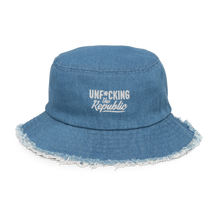 Load image into Gallery viewer, Light denim bucket hat with white embroidered logo that says Unf*cking The Republic
