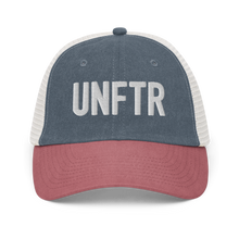 Load image into Gallery viewer, Blue, red and white trucker hat with white embroidered logo that says &#39;UNFTR.&#39;
