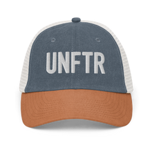 Load image into Gallery viewer, Blue, orange and white trucker hat with white embroidered logo that says &#39;UNFTR.&#39;
