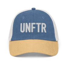 Load image into Gallery viewer, Blue, tan and white trucker hat with white embroidered logo that says &#39;UNFTR.&#39;
