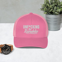 Load image into Gallery viewer, Pink trucker hat with pink side panels with white Unf*cking The Republic logo embroidered on the front
