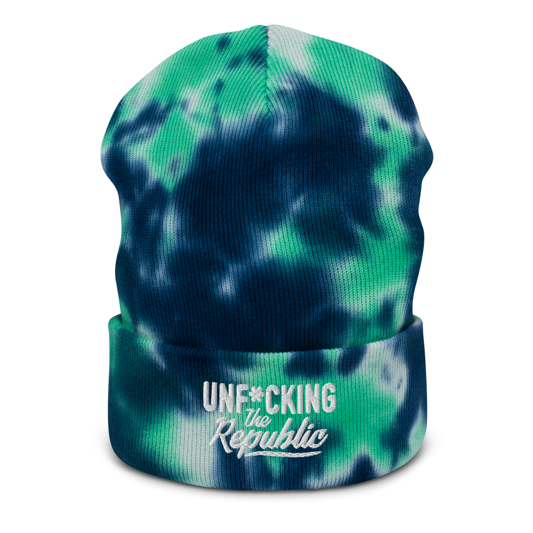 Navy, turquoise and white beanie with embroidered white logo that says ‘Unf*cking The Republic’
