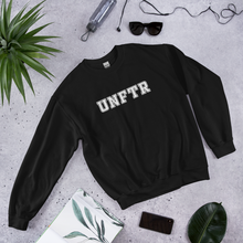 Load image into Gallery viewer, Black crew neck with white block letters that say UNFTR.
