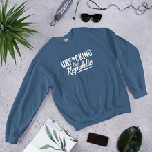 Load image into Gallery viewer, Blue indigo crew neck with white logo that say Unf*cking The Republic.
