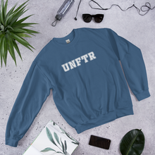 Load image into Gallery viewer, Indigo blue crew neck with white block letters that say UNFTR.
