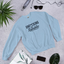Load image into Gallery viewer, Light blue crew neck with navy logo that say Unf*cking The Republic.
