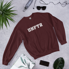 Load image into Gallery viewer, Maroon crew neck with white block letters that say UNFTR.

