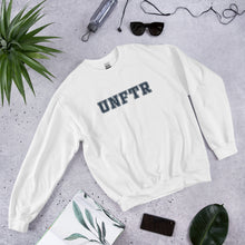 Load image into Gallery viewer, White crew neck with navy block letters that say UNFTR.
