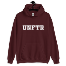 Load image into Gallery viewer, Maroon hoodie with white block letters that say UNFTR.

