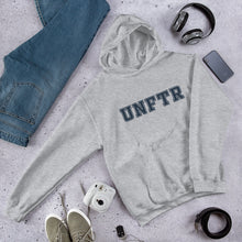 Load image into Gallery viewer, Light heather gray hoodie with navy block letters that say UNFTR.
